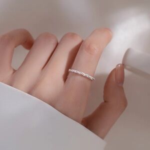 Irrrgular cut off silver ring